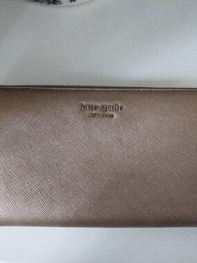 Kate Spade Rose Gold wallet with gold tone zipper